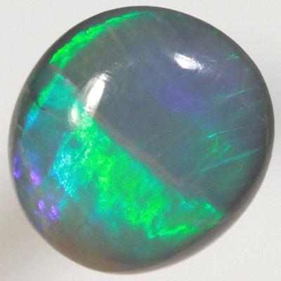 SOLID SEMI BLACK OPAL Bright green rolling flashes